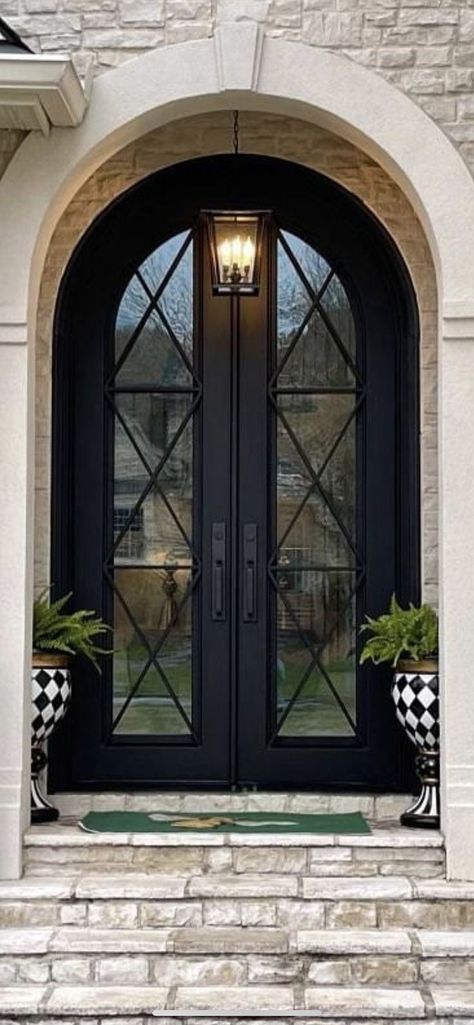 Grand Front Door Entrance Farmhouse, Arched Double Front Doors Wrought Iron, Country French Front Doors, Modern Front Door On Traditional House, French Country Front Door Entrance, Statement Front Door Farmhouse, Double Entry Doors Iron, Double Door Glass Entrance, Arched Double Front Entry Doors