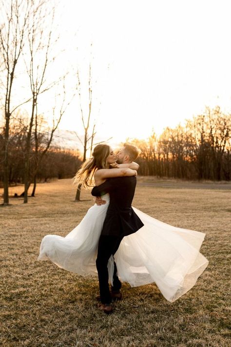 Incredible wedding photo captured at sunset with the groom spinning his bride as they kiss, making her dress twirl and flare. Created the most stunning husband + wife wedding photo! Dress Twirl, Wedding Photo List, Sunset Wedding Photos, Groom Photoshoot, Iowa Wedding, Wedding Portrait Poses, Country Lane, The Color Red, Bride Groom Photos