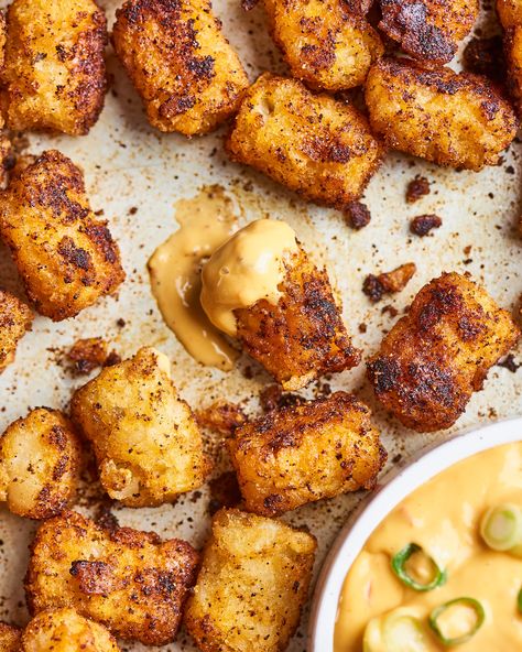 These Clever Tater Tot Recipes Are (Almost) Too Good to Share | Kitchn Tater Tot Nachos, Easy Tater Tot Casserole, Easy Tater Tots, Spicy Queso, Tater Tot Recipes, Cheesy Snack, Making Mashed Potatoes, Tater Tots, Meat Free