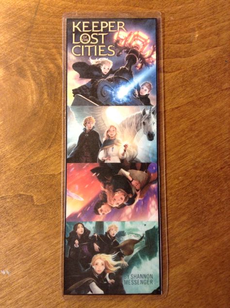 Designed this bookmark and printed it out and lamented it. Because Keeper of the Lost Cities is the best thing ever. Notice how I cropped it so the title is there once and "by Shannon Messenger" is there once. That's why you always name the first book in a series the name of the series. Kotlc Bookmarks, Keeper Of The Lost Cities Merch, Keeper Of The Lost Cities Unraveled, Keeper Of The Lost Cities Fitz, Keeper Of The Lost Cities Neverseen, Teal Eyes, Divergent Hunger Games, The Infernal Devices, Drawing Images