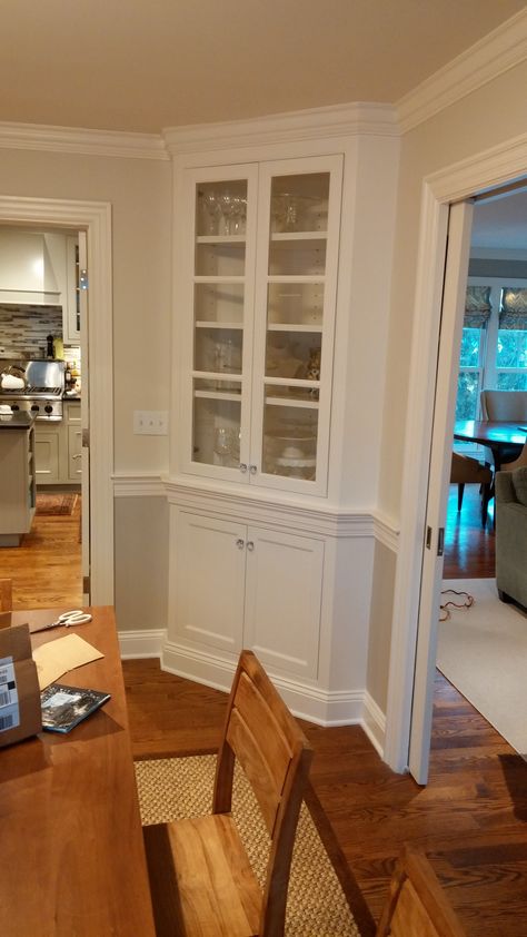 corner cupboard Corner Dining Cabinet, Corner Built Ins Dining Room, Corner Ideas For Dining Room, Corner Bookshelf Built In, Corner Cabinet Ideas Dining, Built In Corner Cabinet Dining Room, Corner Dining Room Cabinet, Corner Larder Cupboard, Dining Room Corner Cabinet