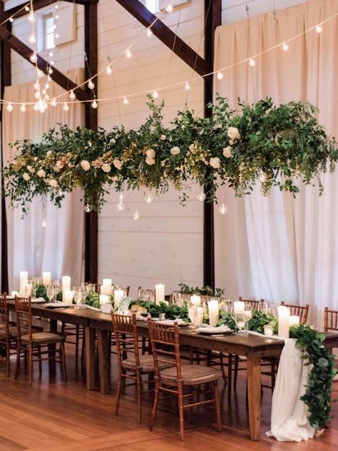 Hanging Wedding Greenery, Vineyard Floral Arrangements, Greenery And Lights Wedding, Hanging Flowers Wedding Reception, Wedding Flowers Hanging, Hanging Greenery Wedding, Wedding Flowers Table, Hanging Greenery, Wedding Flower Design