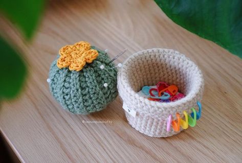 Pom 🌱 Crochet Genshin Friends! on Instagram: "This cactus pin cushion with a secret stitch marker holder is, surprisingly, one of the most useful things I’ve made this year! I’ve been using it for two things: (1) a new Genshin pattern I’m designing (coming soon!!) and (2) sewing! i’m terrible about leaving stitch markers in every nook and cranny, so it’s been super helpful to have a home for them. plus, the pin cushion also keeps my tapestry needles in one place and just makes the perfect hub Crochet Cactus Pin Cushion Free Pattern, Crochet Pin Holder Free Pattern, Crochet Sewing Pin Cushion, Pincushion Crochet Free Pattern, Crochet Cupcake Pin Cushion, Crochet Marker Holder, Crochet Cactus Pin Cushion, Crochet Stitch Marker Holder, Stash Jar Crochet Pattern