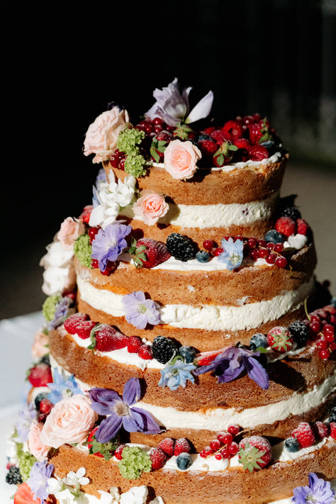 Treat your guests to a slice of elegance with our Naked Berry Wedding Cake! Layers of moist cake adorned with fresh berries and a hint of rustic charm, this cake is a delightful addition to your wedding celebration. Explore more delicious ideas on our website and follow us for wedding inspiration! 💍🍰 #NakedCake #BerryCake #WeddingDessert #RusticChic Indie Wedding Cake, Berries Wedding Cake, Macaroon Cake Wedding, Rustic Floral Wedding Cake, Wedding Cake Non Traditional, Fruit Tart Wedding Cake, Whimsical Wedding Food, Eclectic Wedding Cake, Wedding Deserts Ideas