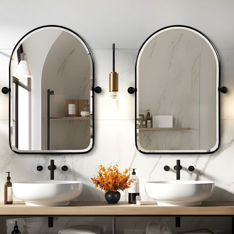 Introducing our sleek Metal Frame Arch Bathroom Wall Mirror Set of Two, crafted to elevate your bathroom decor with sophistication and functionality. Its pivot design allows the position to be adjusted to meet your needs at different angles when using your bathroom mirror.Designed with a durable metal frame that resists rust, these mirrors offer both style and resilience.Its modern and simple design, coupled with the arched top design, combines retro and fashion.Engineered with shatterproof mirr Modern Farmhouse Bathroom Vanity Mirror, Dual Bathroom Mirrors, Modern Farmhouse Bathroom Mirror Ideas, Modern Farmhouse Bathroom Black Hardware, Pivot Vanity Mirror, Vanity Bathroom Mirror Ideas, Black Framed Bathroom Mirrors, Arched Bathroom Mirrors, Modern Bathroom Hardware Ideas