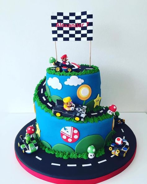 Mario Kart cake, absolutely incredible! Mario Go Kart Birthday Party, Mario Bday Cake Ideas, Mariokart Birthday Cakes, Mario Movie Birthday Cake, Mario Birthday Cake 5, Mario Kart Cake Pops, Super Mario Kart Birthday Cake, Super Mario Race Track Cake, Mario Cakes For Boys