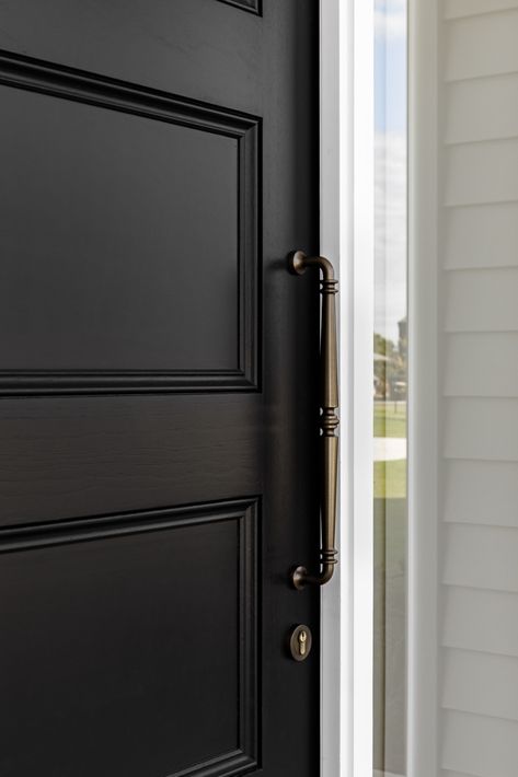 This grand entry features an expansive black panelled front door with surrounding glass windows, adorned with the Sarlat pull handle in Signature Brass, inviting guests to enter this bright and airy home. Bright And Airy Home, Airy Home, Black Exterior Doors, White Front Door, Grand Entry, Black Front Doors, House Front Door, Glass Front Door, Pull Handles