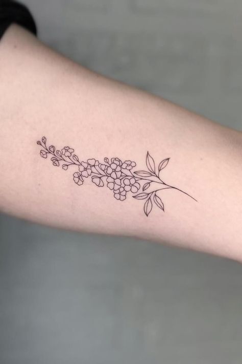 Beautiful Lilac Tattoos: Ideas, Designs, and Meanings Lilac Tattoo Stencil, Lilac Line Tattoo, Lilac Hip Tattoo, Dainty Lilac Tattoo, Lilac Tattoo Fine Line, Lilac Flower Tattoo Simple, Lilocks Flower Tattoo, Lilac Tattoo Outline, White Lilac Tattoo