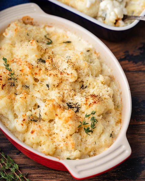 Delicious and creamy, this Cauliflower au Gratin is a favorite side dish that even picky eaters love! It combines cauliflower, cream, Gruyere and Pecorino that's topped with thyme and breadcrumbs and baked until golden. It's especially great for Thanksgiving! #sidedishes #augratin #cauliflower Augratin Cauliflower, Cauliflower Au Gratin, Cauliflower Cheese Bake, Cauliflower Cream, Sip And Feast, Creamy Scalloped Potatoes, Au Gratin Recipes, Cauliflower Gratin, Thanksgiving 2024