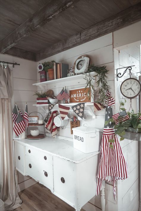 breakfast nook in cottage, open shelving in kitchen, kitchen open shelves, patriotic decor on open shelves Farmhouse 4th Of July Decor, Kitchen Decor Cottage, Decor In Kitchen, Farmhouse 4th Of July, Patriotic Kitchen, Antique Ideas, Old Victorian House, Lady Decluttered, Core Decor