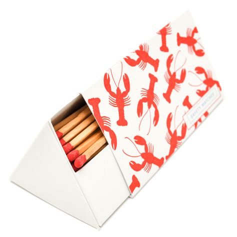 A wonderfully quirky box of high quality matches by luxury matchbox makers Archivist. This beautiful design features a red and white lobster Quirky Packaging, Lobster Poster, Reusable Things, Box Of Matches, Minimalist Furniture Design, Match Boxes, Letterpress Design, Match Striker, Box Creative