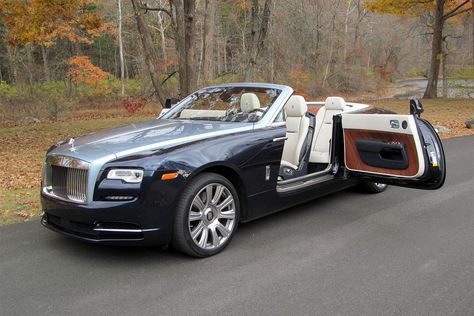 The 2016 Rolls-Royce Dawn convertible is both massive and massively luxurious. It’s the kind of car only Rolls could make. Rolls Royce Dawn, Rolls Royce Motor Cars, Bmw Classic Cars, New Sports Cars, Pagani Huayra, Best Classic Cars, British Cars, Sports Cars Luxury, Car Car