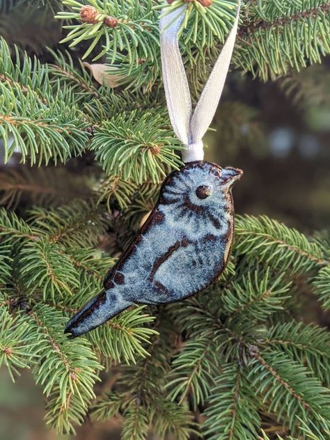 Blue Bird Ornament,  Handmade Ceramic, Ready to Ship This bird ornament is glazed with a flowing blue glaze with a little brown in the pattern.  These bird ornaments were handmade in my studio in Camden, NJ.  Pattern may vary slightly since each one is handmade.  Measurements Hight: 1.5'' Width: 3'' My process: Interested in learning more about my process? You can see some behind-the-scenes footage on my Instagram page here: @worksofhope Ceramic Xmas Ornaments, Pottery Christmas Ornaments, Ceramic Birds Wall, Fun Pottery, Pottery Creations, Holiday Pottery, Birthday Heart, Pottery Christmas, Ceramic Christmas Decorations