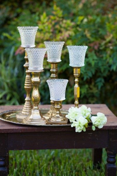 Reception Table Lighting! No Open Flame Venue? No Problem - Pop A Led in these glass votives. Brass Candlesticks with Pressed Glass Votives “Retro Style” Winter Wedding Centerpieces, Candle Stick Decor, Glass Votive Candle Holders, Practical Wedding, Vintage Brass Candlesticks, Diy Candle Holders, Event Table, Wedding Centerpieces Diy, Glass Votive