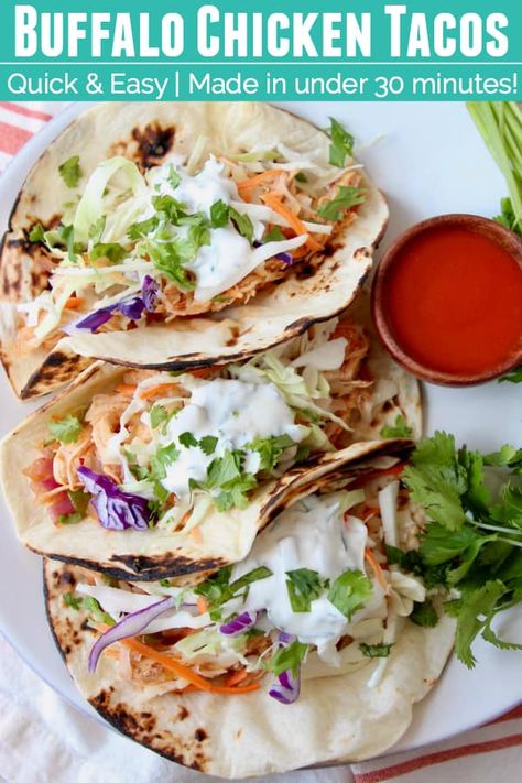 Shredded chicken tossed with tangy buffalo sauce, tucked inside warm tortillas, topped with a creamy cilantro lime sauce, life doesn't get much better than these Buffalo Chicken Tacos! This easy recipe is made in just 29 minutes, perfect for weeknight dinners! #buffalochicken #buffalosauce #tacos Creamy Cilantro Lime Sauce, Crockpot Shredded Chicken Tacos, Shredded Chicken Sandwiches, Buffalo Chicken Tacos, Shredded Chicken Crockpot, Shredded Buffalo Chicken, Easy Shredded Chicken, Lime Chicken Tacos, Slow Cooker Shredded Chicken