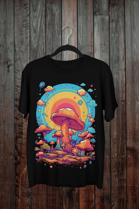 The trippy mushroom T-shirt in black is a mesmerizing piece of wearable art designed for both men and woman. Featuring a captivating fantasy art motif, this tee embodies a blend of hippie, retro, and vintage vibes. Its eye-catching design showcases intricate mushrooms, creating a visually stunning and mind-bending experience. Crafted with style and comfort in mind, this shirt is the perfect addition to any free-spirited individual's wardrobe. Mushroom Fantasy Art, Trippy Mushroom, Mushroom T Shirt, Hippie Shirt, Vintage Mushroom, Art Shirt, Free Spirited, Art Shirts, Showcase Design