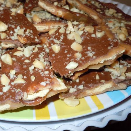 I have been making this for years and my friends have nicknamed crack....cuz it's so addicting!    Sweet and Saltines (Trisha Yearwood) Recipe | Key Ingredient Sweet And Saltines, Christmas Toffee, Trisha Yearwood Recipes, Cracker Candy, Toffee Candy, Trisha Yearwood, Christmas Cookies Easy, God Mat, Vegetarian Chocolate