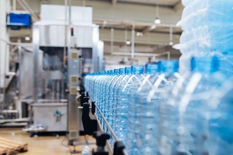 Factory Photography Industrial, Factory Photography, Water Factory, Photo Water, Work Photography, Plants In Bottles, Manufacturing Plant, Blue Bottle, Spring Water