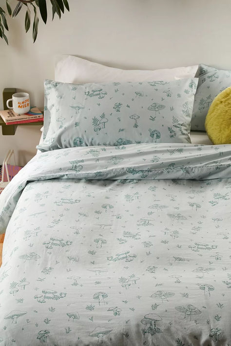 Add a foraging flourish to your bedroom space with this mushroom bedding. Crafted from super soft cotton, this matching duvet and pillowcase set is complete with sketch-style mushroom motifs. Mushroom Comforter, Mushroom Sketch, Urban Outfitters Bedding, 70’s Decor, Duvet Covers Urban Outfitters, Blue Mushroom, Boho Whimsical, Boho Duvet, Cottagecore Home