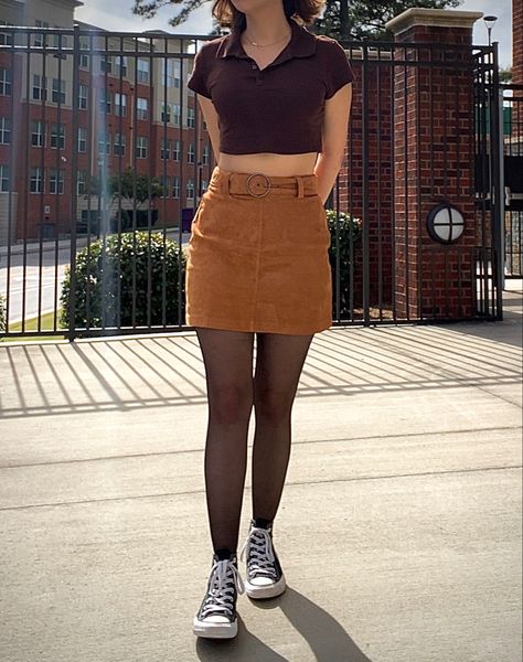 Fall Aesthetic outfit. Black converse with tights, orange-ish brown suede skirt with brown collared crop top. Black Top Brown Skirt, Brown Skirt With Black Tights, Brown Skirt Summer Outfit, Brown Courdory Skirt Outfits, Converse With Tights, Short Brown Skirt Outfit, Brown Skirt Outfit Aesthetic, Brown Corduroy Skirt Outfit, Brown Suede Skirt Outfit