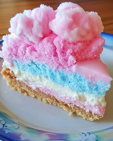 🎡 Cotton Candy Cheesecake 🎡 Ingredients: - 1 1/2 cups graham cracker crumbs - 1/4 cup granulated sugar - 1/2 cup unsalted butter, melted - 16 oz cream cheese, softened - 1 cup powdered sugar - 1 teaspoon vanilla extract - 1 cup heavy cream - 1 cup cotton candy, plus extra for topping - Food coloring (optional) Instructions: 1. Preheat the oven to 325°F (163°C). Grease a 9-inch springform pan. 2. In a bowl, mix graham cracker crumbs, sugar, and melted butter until combined. Press the mixtur... Cotton Candy Cheesecake, Candy Cheesecake, Cotton Candy Recipe, Cotton Candy Cake, Cotton Candy Cakes, Cheesecake Ingredients, Candy Cakes, Springform Pan, Dessert Lover