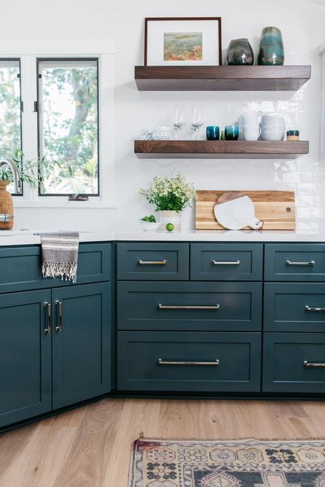 Dark cabinetry has become one of the best ways to make a statement in the kitchen, mud room or butler's pantry.  We are loving this trend towards a bold and colorful home details.  One of our favorite combinations is dark cabinetry w... Teal Kitchen Cabinets, Kitchen With Dark Cabinets, Teal Cabinets, Teal Kitchen, Minimalist Kitchen Design, Blue Cabinets, Dark Kitchen Cabinets, Up House, White Countertops