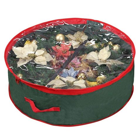 PRICES MAY VARY. Made out of top quality materials, Primode's Xmas wreath storage bags are strong and protective. These wreath container bags are 30” in diameter and expandable to 7” tall. Each Xmas wreath bag is fitted with a sturdy zipper and a set of buckle straps. The clear window on the front of the wreath bag allows you to view the interior without unzipping.The handle attached to the top of the holiday wreath bag makes it incredibly easy to carry. We are confident that you will enjoy the Window Garland, Wreath Storage, Holiday Storage, Clear Window, Xmas Wreaths, Clear Windows, Christmas Tops, Christmas Party Dress, Simple Holidays