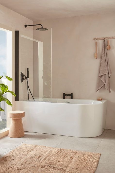 Neutral bathrooms: design ideas and inspiration Corner Bath With Shower Screen, 2 Person Bathtub Shower Combo, Double Ended Bath With Shower Over, Corner Bath Bathroom Ideas, Modern Corner Bathtub Ideas, Over Bath Shower Ideas, Narrow Bathroom Ideas With Tub, Soaking Tub Small Bathroom, Free Standing Bath Tub Ideas