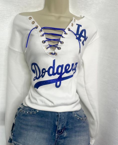 LA Dodgers off the shoulder sweater - White with blue glitter lace. Please note estimated time to ship these items is 7-10 business days as they are made to order. If you need it right away please send us a message and we will try our best to accommodate your request. Dodgers Outfit Women, Dodgers Outfit, Off The Shoulder Sweater, Sweater White, Blue Glitter, Shoulder Sweater, White Sweaters, Festival Season, Favorite Outfit