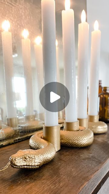 Kalyn - Thrift with Me | Easy DIY | Affordable Home Decor on Instagram: "✨ Viral DIY Alert! ✨ Back by popular demand, I’m sharing my “look for less” version of the iconic Harry Potter candelabra from Pottery Barn! 🕯️✨ I used Ace Hardware’s gold metallic spray paint for that perfect golden finish, and it worked like a charm! However, if you find the paint isn’t sticking to your snake, try starting with a primer—it’ll make all the difference! 🐍🔩 And for extra hold, consider adding some heavy-duty super glue alongside the hot glue.  🎃 Want more affordable home decor tips and designer looks for less? Hit that follow button and stay tuned!  If you’re ready to make your own magical candelabra, COMMENT “Harry Potter” below, and I’ll send the material list directly to your inbox! 🖤⚡  #Hallowe Halloween Candleabra, Diy Candelabra, Thrift With Me, Pretty Halloween, Halloween Crafts Decorations, Barn Design, Harry Potter Diy, Halloween Diy Crafts, Diy Pottery