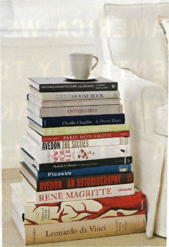 Book stack as side table Pile Of Books, Book Table, Room Photo, Rene Magritte, Small Space Solutions, Up House, Real Simple, One Bedroom Apartment, Stack Of Books