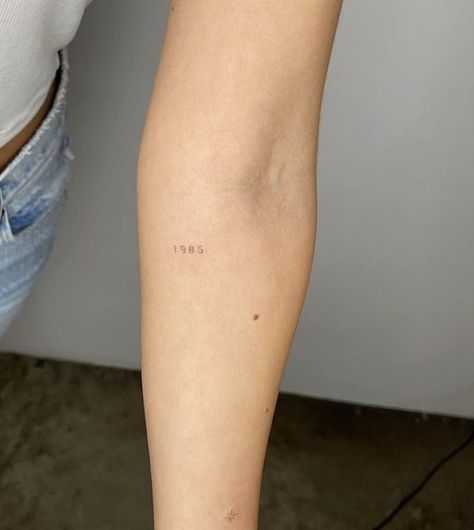 Tiny Number Tattoos For Women, Subtle Arm Tattoos For Women, Fine Line Tattoo Numbers, Minimalist Number Tattoo, Small Elbow Tattoos For Women, Fine Line Number Tattoo, Tiny Number Tattoo, Numbers Tattoo Ideas, Back Of Elbow Tattoos For Women