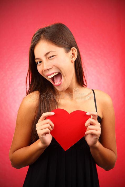 Valentines day woman. Woman holding Valentines Day heart sign. Beautiful mixed r , #Ad, #holding, #Day, #heart, #Woman, #Valentines #ad Holding Heart Pose, Holding Heart Reference, Woman Stock Photo, Face References, Holding Heart, Valentines Day Heart, Heart Photography, Hugging Couple, Pose References