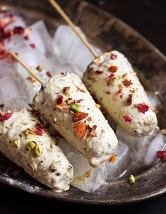 Thandai kulfi is a very interesting and rich frozen dessert with full fat milk, secret spice blend and loads of dry fruits. Perfect thandai flavored treat for summer. Check out recipe @ cookclickndevour.com #thandaikulfi #cookclickndevour #vegetarianrecipes Kulfi Falooda Photography, Snacks Vegetarian, Indian Delicacies, Desi Recipes, Indian Thali, Dessert Wedding, Desi Street Food, Kulfi Recipe, Bengali Culture