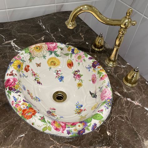 Another Scented Garden design painted bathroom sink? This time on a petite Barclay Sienna Drop-in, about 14” wide. Perfect for a small powder room or counter. This one features tons of flowers, butterfllies and a hummingbird. Custom-made with matching toilet and murals. Check out our decorated bathroom fixture blog or visit the website for more inspiration. #handpaintedsink #bathroomsink #bathroomideas #bathroomdecor #victorian #decoratedbathroom #interiordesign #bathroom #roses #painted sink Cottage Bathroom Sink, Painted Sinks Bathroom, Painted Bathroom Sink, Decorated Bathroom, Painted Sink, Small Powder Room, Chic House, Drop In Bathroom Sinks, Painted Bathroom