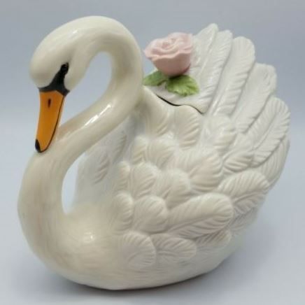 This is a beautiful teapot in the white “Serene Swan” pattern made in China for Lenox. It also comes in the gray “Tranquil Swan”. It is hand painted and the lid has an applied pink rose. It is marked on the bottom. The teapot is 6¾" tall, 9⅜" long and 6" wide and holds 48 ounces. Swan Pattern, Ceramic Teapot, Textile Doll, Ceramic Teapots, The Gray, Cute Gif, Pattern Making, Pink Rose, The White