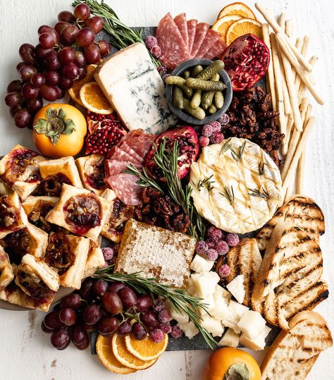 Author Kylie Mazon-Chambers strikes just the right balance of flavors, textures and complementary ingredients. Holiday Cheese Board, Winter Appetizers, Appetizer Board, Holiday Cheese Boards, Brie Puff Pastry, Baked Camembert, Holiday Cheese, Frozen Puff Pastry, Holiday Appetizers