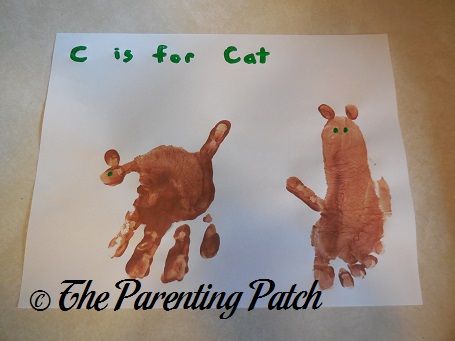 C Is for Cat Handprint and Footprint Craft | Parenting Patch Handprint Alphabet, Handprint And Footprint Crafts, Toddler Alphabet, L Is For Lion, C Is For Cat, Fingerprint Crafts, Abc Crafts, Alphabet Letter Crafts, Footprint Craft