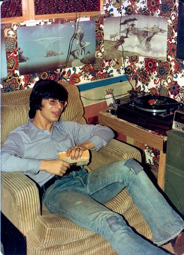 1970s: Gerry Jablonski Listening to YES and Reading Tolkien  "This is a photo from my basement, or more correctly my parent's basement, where my room was in the 1970s and again, during grad school, in the 1980s. Note the Yes album on the turntable, the patches on Gerry's jeans, the Tolkien novel in his hand, and most of all, the real reason for posting this - THE WALLPAPER! " Tumblr