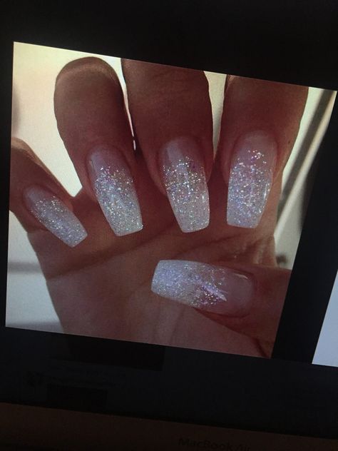 White And Glitter Nails Coffin, Silver Nails Prom Acrylics, White Glitter Fade Nails, Sparkly White Christmas Nails, Milky White Nails With Glitter Accent, White Sparkle Ombre Nails, White Sparkle French Tip Nails, White Glitter Ombre Nails, White Nails Sparkle