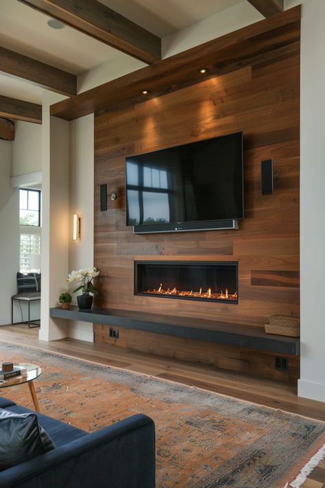 Upgrade your living area with trendy fireplace wall ideas, including a wall-mounted TV. Discover more inspirations in this article. Fireplace Wall Low Ceiling, Linear Fireplace Wall With Tv, Linear Electric Fireplace Ideas With Tv Built Ins, Modern Fireplace With Storage, Television Fireplace Wall Ideas, Electric Fireplace With Accent Wall, Recessed Wall Niche Ideas Living Room, Accent Wall With Mantle, Fire Place Tv Wall