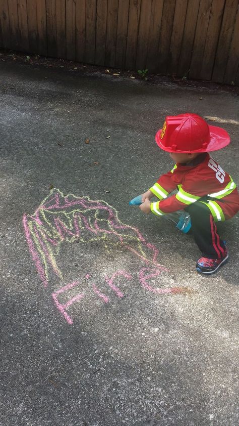 Firefighter Role Play to put out "Chalk Fires" by spraying them with water using a spray bottle to put out the "Chalk Flames." I used this fun learning activity to help my son recognize more words that start with the letter F...words like Fire, Firefighter, Flames, Fire Truck. He was really engaged during the entire activity and enjoyed spraying the letter F, along with the fire. :) Firefighter Role Play, F Is For Fire Truck, Firefighter Activity, Fire Safety Lessons, Fire Safety Theme, Community Helpers Activities, Fire Safety Activities, Fire Safety Preschool, Fire Safety Week