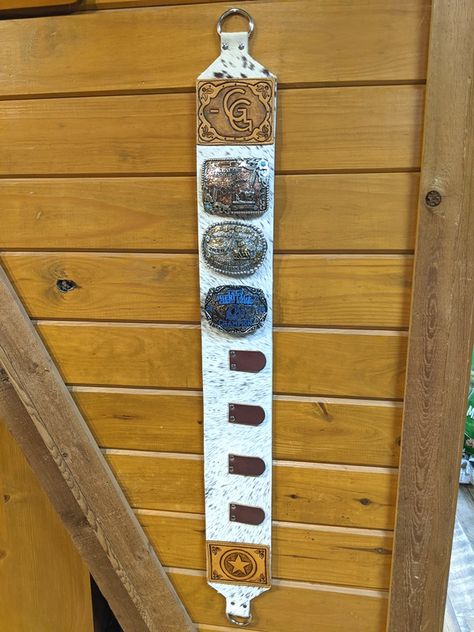 Buckle Wall Display, Belt Buckle Storage Ideas, Leather Belt Buckle Display, Livestock Ribbon Display, Cowhide Display Ideas, Belt Buckle Wall Display, Rodeo Buckle Display, Western Belt Buckle Display, Diy Buckle Display