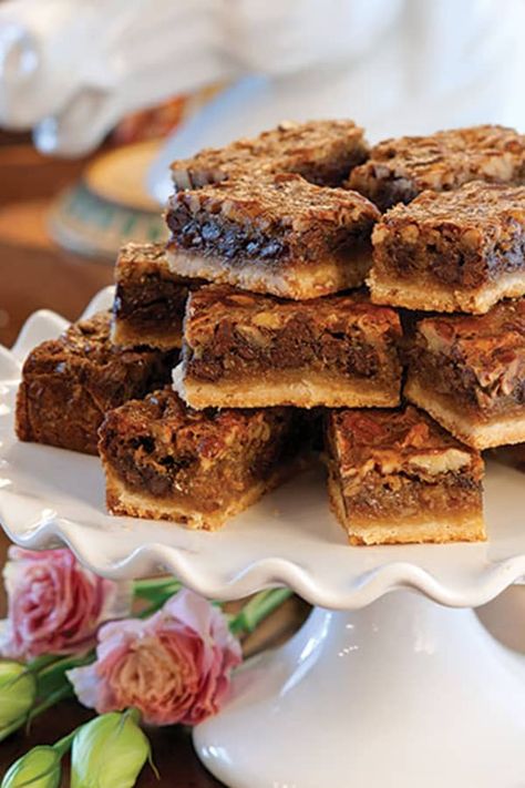 Celebrating the Derby with these simple and delicious Kentucky Derby Bars. Much like Derby Pie, these bars are packed with traditional elements like butter, eggs, pecans, and of course, chocolate.