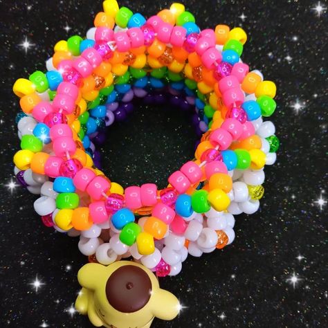 pompompurin rotating kandi cuff!!! 🩷🌸❤️🌸🧡🌸💛🌸💚🌸💙🌸💜 🎀 available on my etsy! ♡ check out my page for tons of other kandi + jewelry pics >:3 ♡ handmade with love by me! ♡ freebies with every order! thank you for your support <33 🩷🌸❤️🌸🧡🌸💛🌸💚🌸💙🌸💜 shares are greatly appreciated! you are helping me grow my small business <3 PLUR!! 🫶🌈 #kandi #kandikid #kandicuff #kandibracelet #kidcore #scenecore #dreamcore #pinkcore #kawaii #decora #fairykei #sanriocore #rainbowcore #pompompurin #pompompurinlover... Rotating Kandi Cuff, Kandi Jewelry, Jewelry Pics, Kandi Inspo, Diy Kandi Bracelets, Diy Kandi, Rave Clothes, Kandi Kid, Kandi Ideas