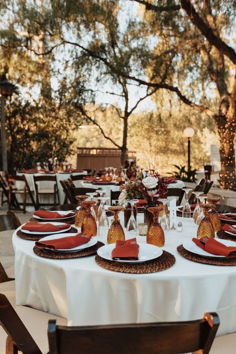 Sweetheart Table Terracotta, Amber Goblets Table Setting, Terracotta Wedding Circle Table, Maximalist Wedding Table Decor, October Wedding Table Settings, Burnt Orange Table Setting Wedding Ideas, Amber Goblets Wedding, Amber Centerpiece Wedding Ideas, Wedding Table Plates