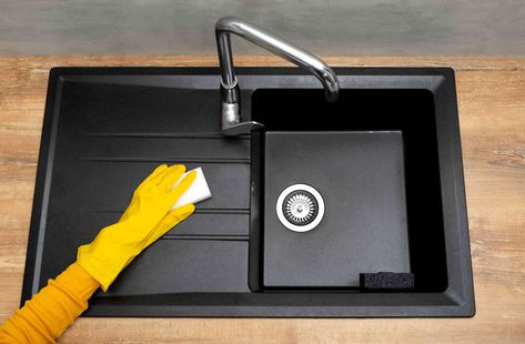 Black composite sinks are durable and stylish, but to keep yours in great shape for years, you'll need to clean it with the proper solution and materials. Homemade Drain Cleaner, Composite Kitchen Sinks, Quartz Sink, Composite Sinks, Clean Kitchen Sink, Composite Sink, Black Kitchen Sink, Mudroom Ideas, Black Sink