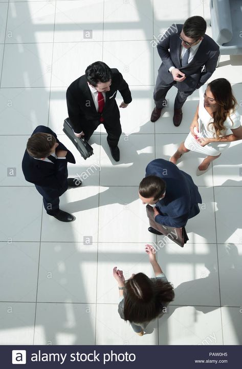 top view.a group of business people standing on a marble floor Stock Photo - Alamy People Top View, Anatomy Poses, Human Poses Reference, Holiday Flyer, Human Poses, Character Poses, Dynamic Poses, Figure Drawing Reference, Marble Floor