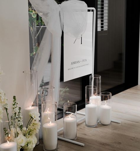 One of the candle installations we did for @iyialiu and Jordan’s stunning engagement party, was for their welcome sign. This entrance install greeted guests on arrival, and ended up being a beautiful backdrop for guest photos. To elevate and complement wedding or event signage, consider adding a range of our luxury candles. It just adds that magic touch x @milliecreative.nz @devonportflowers • • • • #engagement #engagementparty #eventcandles #weddingcandles #weddingsignage #seatingsign ... Engagement Party Signage, Candle Installation, Party Signage, Seating Sign, Event Signage, Beautiful Backdrops, Wedding Candles, Luxury Candles, Wedding Signage