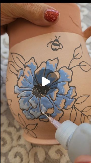 Pottery Painting Before And After, Underglaze Flower Painting, Pottery Floral Designs, Pottery Made By Hand, Painting With Glaze Ceramics, Underglaze Painted Pottery, Painting Flowers On Pottery, Pottery Glaze Designs, Slip Painting Ceramics